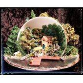 House shown in a teacup scene